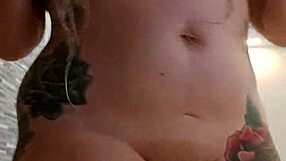 alina modelista, the blonde tattooed slut, masturbates in the jacuzzi, her shaved pussy wet.