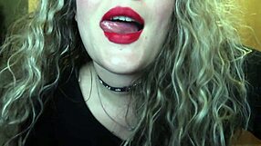 Curvy teen with red lips smokes cigarette up close for you