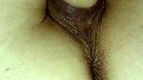 Teasing my wet pussy with a dildo on the bed