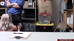 Blonde officer forces lingerie-clad thief to suck monster cock in office