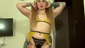 alina modelista flirts in sexy yellow set, blonde tattooed beauty