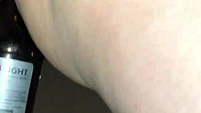 wife plays with bottle in naughty game