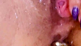 i plays with my shaved wet pussys in the showers with ass plugs