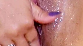 i plays with my shaved wet pussys in the showers with ass plugs