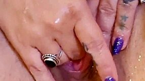 i plays with my shaved wet pussys in the showers with ass plugs