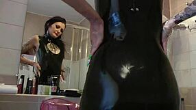 dominatrix nika seduces in black latex dress