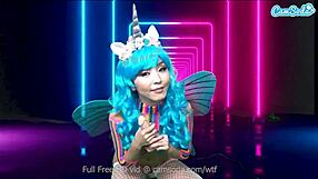 marica hase hints at pleasure while riding the sybian machine.