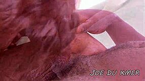 a brunette woman relaxes by the pool in a reality setting with friends