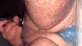 Gay guy moans with anal plug