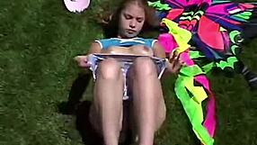 Does sweet little april lollipop masturbate her pussy outdoors?