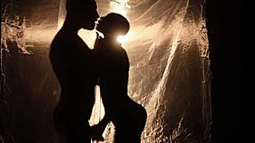 ebony woman in stockings and lingerie masturbates roughly in interracial scene