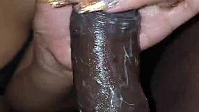 Amateur ebony wife gives sloppy blowjob with handjob on big black cock