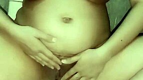 Sexy babe fingering herself nude in the toilet.