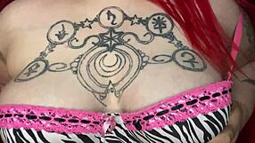 Hey, check out this sexy BBW massaging her big natural tits with oil in homemade lingerie.