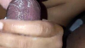 Amateur ebony wife gives sloppy blowjob with handjob on big black cock