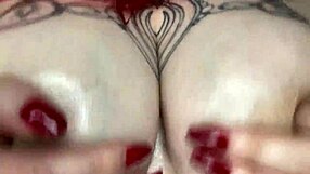 Hey, check out this sexy BBW massaging her big natural tits with oil in homemade lingerie.