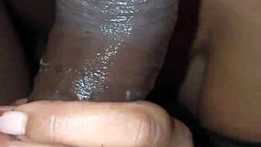 Amateur ebony wife gives sloppy blowjob with handjob on big black cock