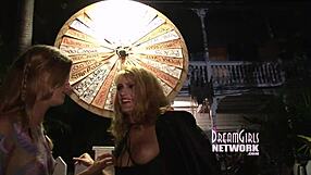 Spin the wheel and eat some pussy at this outdoor lesbian party fantasy