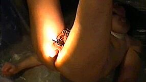 i experience a long bondage session with candles burning on my body