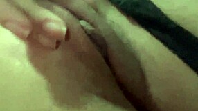 A latina beauty with natural tits indulges in solo masturbation
