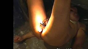 i experience a long bondage session with candles burning on my body