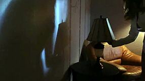 Busty Brett teases with masturbation in red high heels