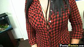 A hot brunette named Kitty Bella receives a facial cumshot from an amateur, with cum dripping on her face in this detailed scene.