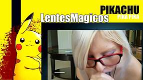 A blond woman with glasses is giving oral sex to a black man