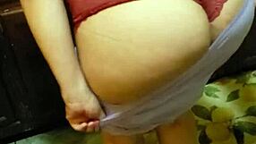 Latina wife showing her panties in a playful way.