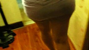 Latina wife showing her panties in a playful way.