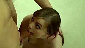 Teen Dolly masturbates with banana in kitchen