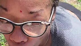 Ebony slave holds pee outdoors as master pisses on her during desperation play.