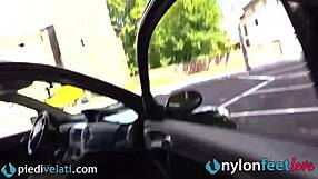 Brunette exposes nylon feet and ass on busy street
