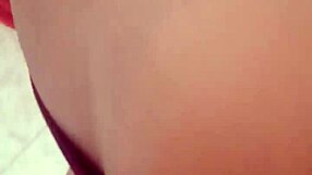 Wife cleans house while chatting