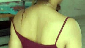 Wife cleans house while chatting