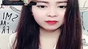 I am watching Jin Xinh Bunny's live show with her face showing