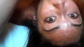 Asian amateur mimics the experienced partner and props her head to receive choking and deep throat