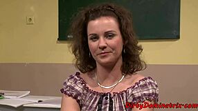 The submissive schoolgirl endures throatfucking with a dildo in bondage