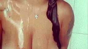 Morena with big tits and ass taking bath, showing off completely in shower on red, Bruna Paz