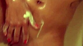 Hot busty Latina enjoys shower time