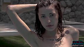 gorgeous russian playboy babes jana bubu and oksana oksi strip nude by the pool.