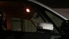 I am experiencing car interior exposure in Japan. Asian woman flashing discreetly.