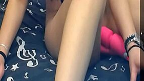 Hey, check out this girl rocking two vibrating dildos like a pro!