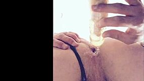 teenage sissy in chastity stretches hole with homemade toy