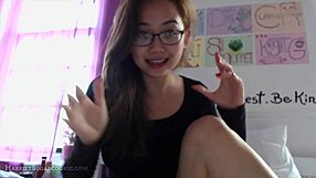 Asian teen with big tits and glasses vlogs amateur scenes