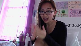 Asian teen with big tits and glasses vlogs amateur scenes