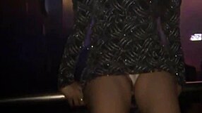 Kim shows off her pussy in a thong at the df club, teasing with every move