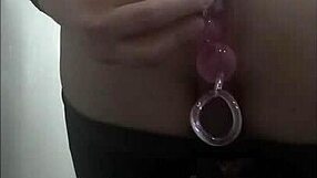 sexy travesti plays with anal balls under clothes