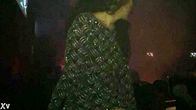 Kim shows off her pussy in a thong at the df club, teasing with every move