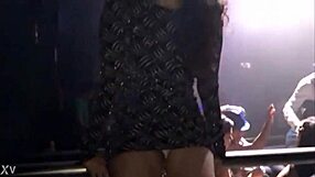 Kim shows off her pussy in a thong at the df club, teasing with every move